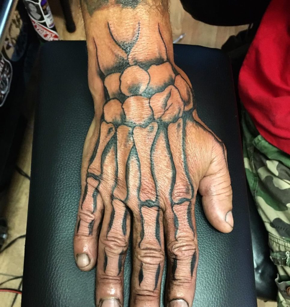 check out these 32 creepy-cool skeleton hand tattoos! 