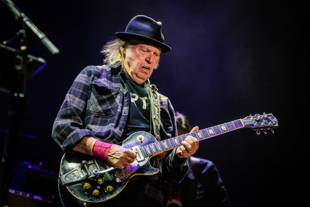 Neil Young Boldly Challenges Spotify to Remove Joe Rogan's Podcast For Faux COVID-19 Information
