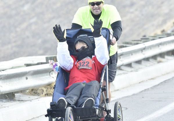 James Ridgeway Pushes His Daughter's Wheelchair For an Astonishing 10 Half Marathons